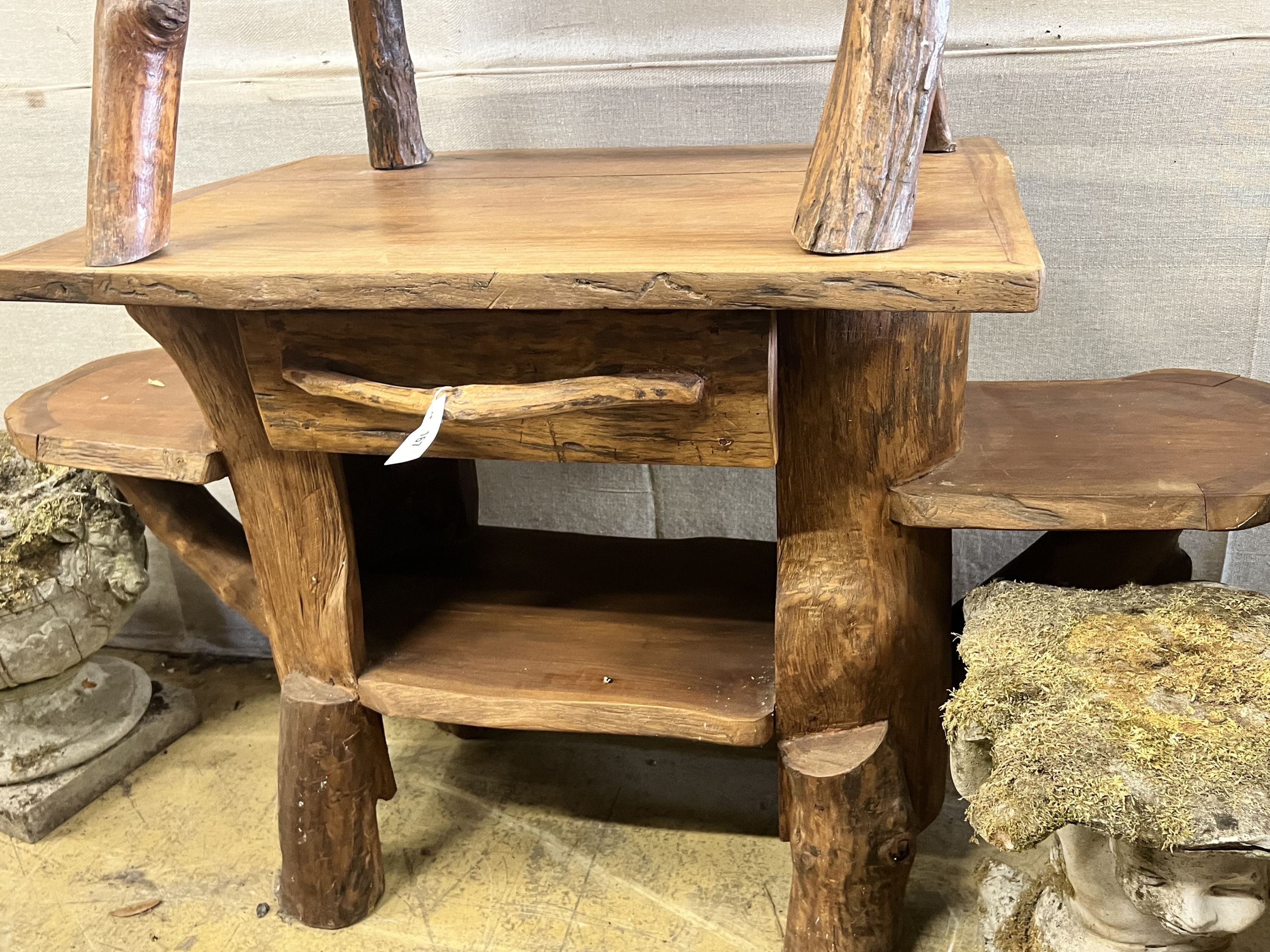 A rustic fruitwood side table and chair, table width 148cm depth 62cm height 81cm
